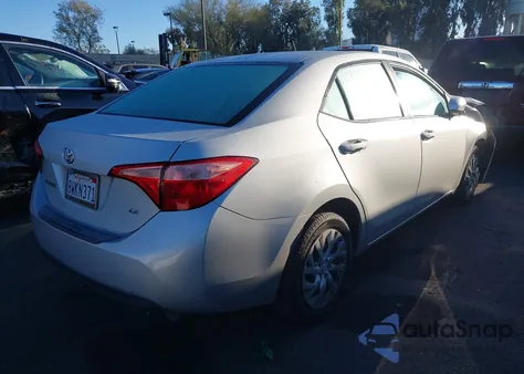 2018 Toyota Corolla Le from USA, damaged, VIN 5YFBURHE8JP838284